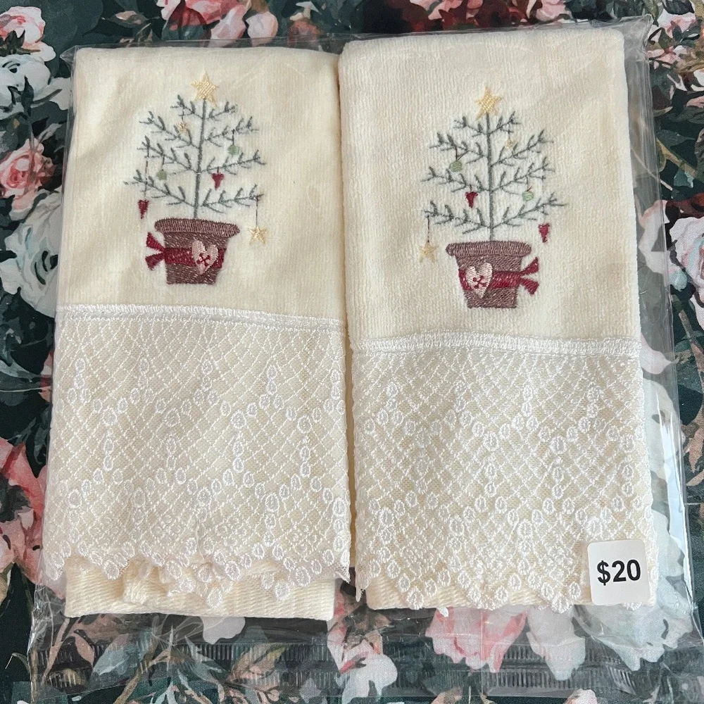 Two embroidered Christmas hand towels